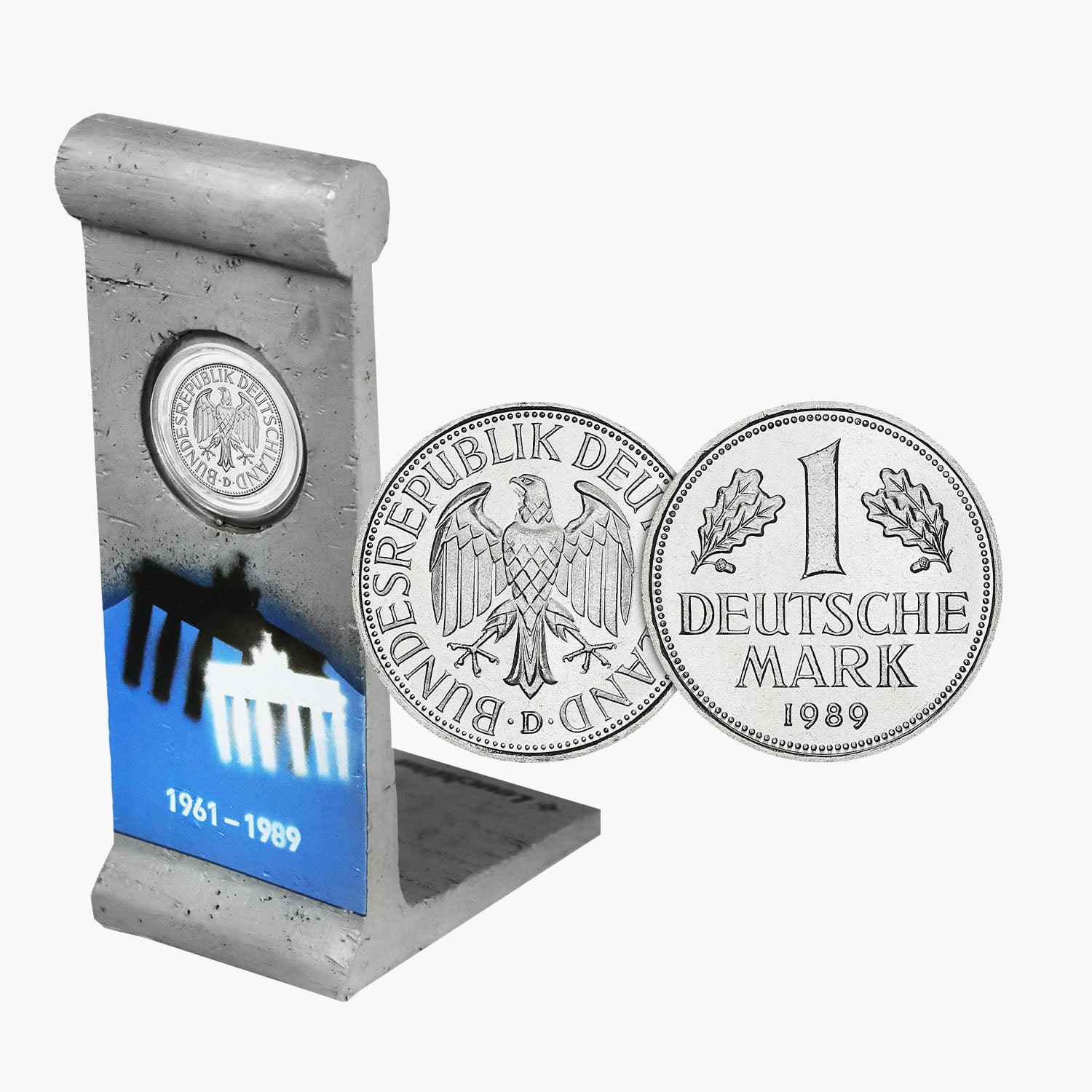 1989 1 Deutsche Mark coin in Berlin Wall section